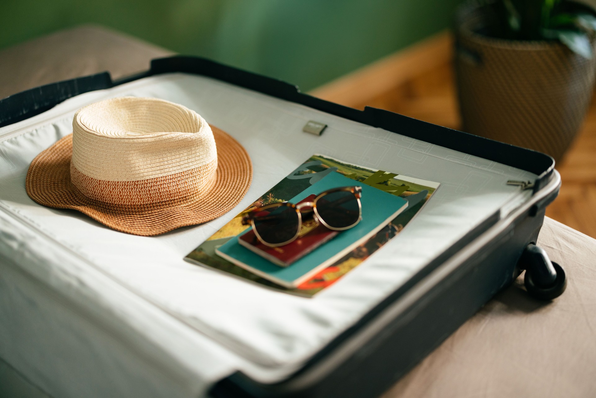 Female Summer Vacation Essentials Ready for Packing in the Suitcase